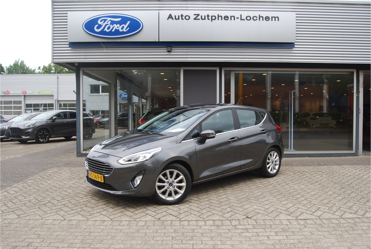 Ford Fiesta - 1.0 EcoBoost Titanium 100pk AUTOMAAT | 2E EIG | PARK.CAMERA | NAVIGATIE | APPLE/ANDRIOD | - AutoWereld.nl
