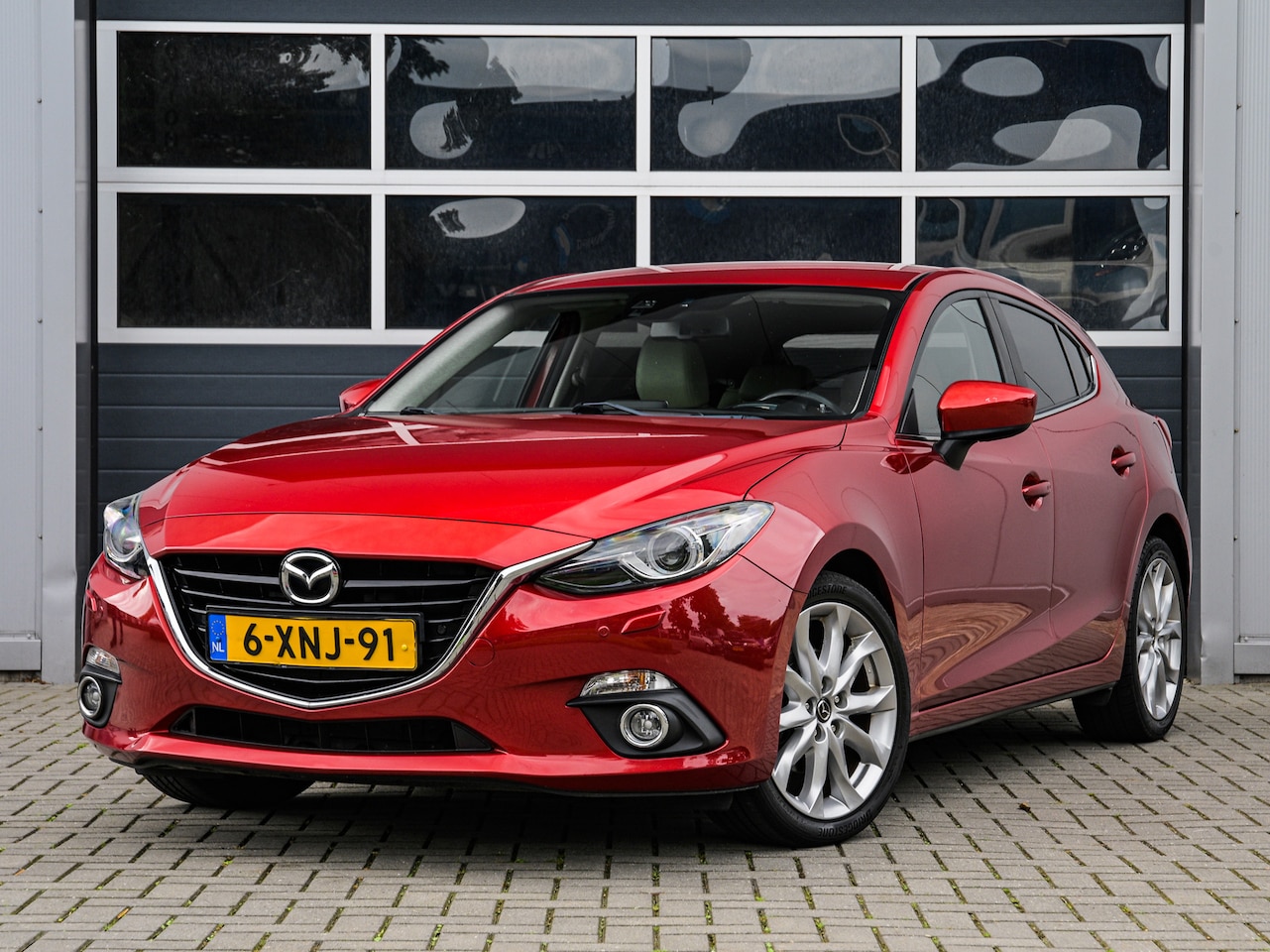 Mazda 3 - 2.0 GT-M | Leder | Xenon | Keyless | Head-up display | Bose | Trekhaak | PDC v+a | Stoelve - AutoWereld.nl