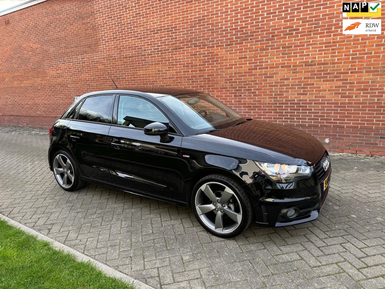 Audi A1 Sportback - 1.2 TFSI S-Line Admired Airco Navi Cruise - AutoWereld.nl