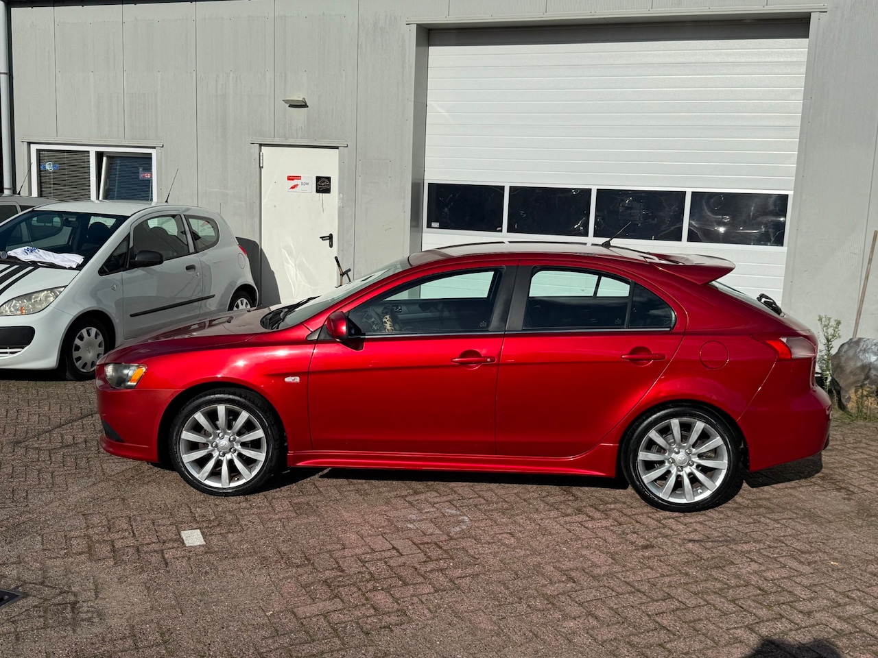 Mitsubishi Lancer Sportback - 1.8 Intense 1.8 Intense - AutoWereld.nl