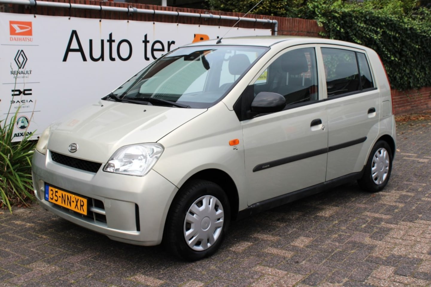 Daihatsu Cuore - 1.0 i 12V Nagano 5 deurs stuurbekrachtiging - AutoWereld.nl
