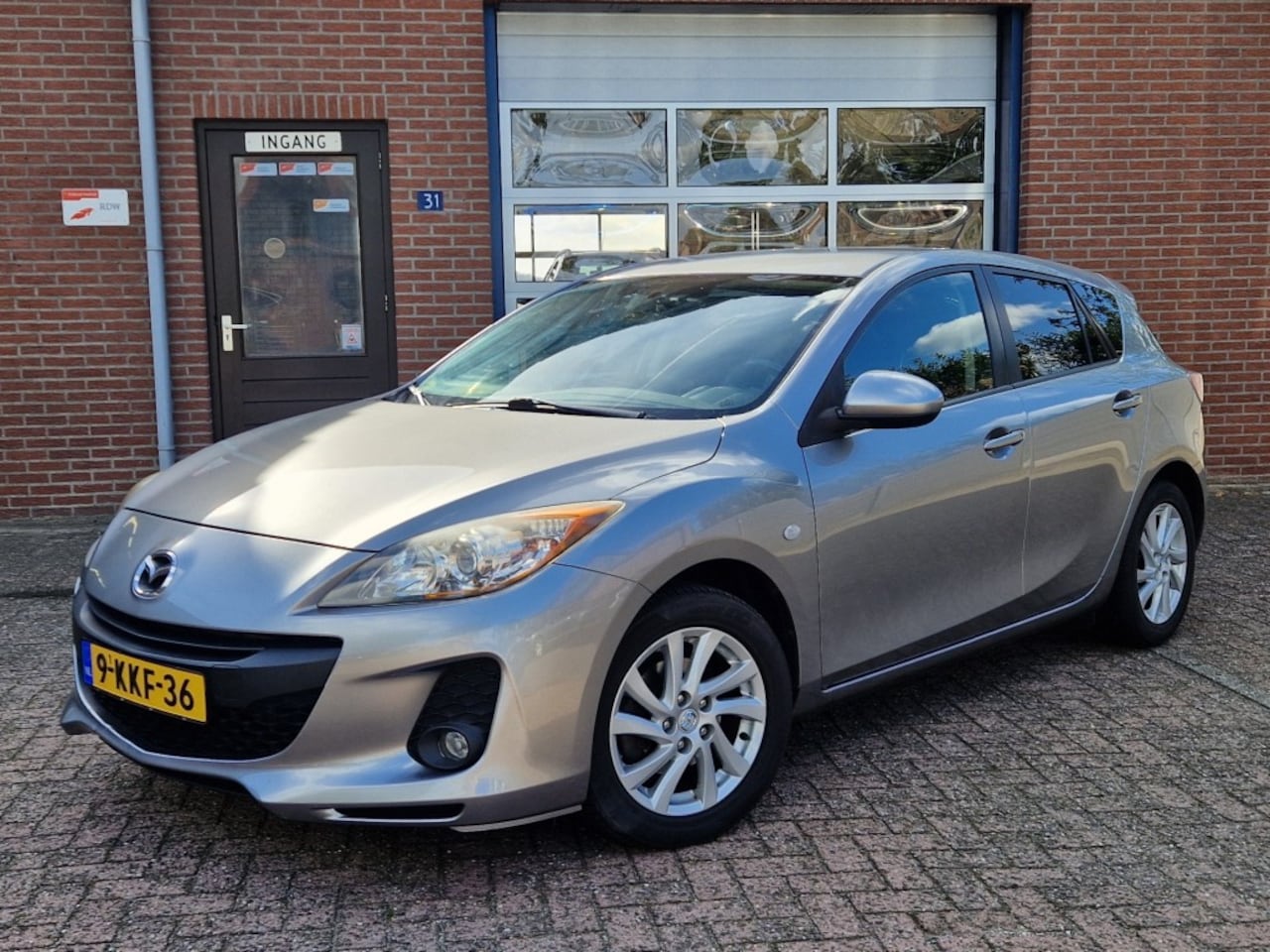 Mazda 3 - 1.6i Business NL-auto Clima Cruise Afn.Trekhaak Navi Dealer OH - AutoWereld.nl