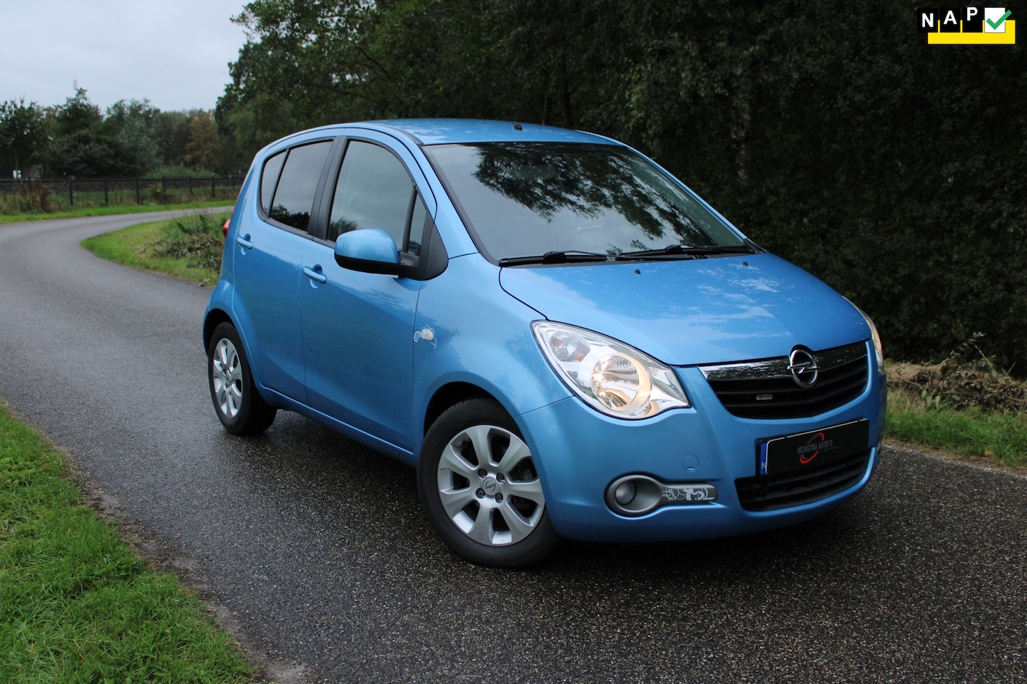 Opel Agila - 1.2 Enjoy Agila.com Uniek 15/50 Navi, Airco, NAP! - AutoWereld.nl