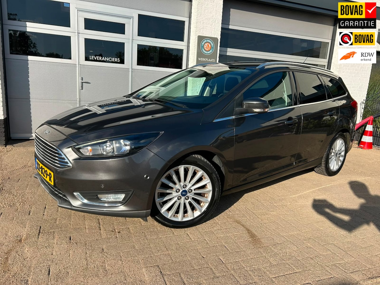 Ford Focus Wagon - 1.0 Titanium SYNC|PDC|CAMERA|STOELVERW - AutoWereld.nl