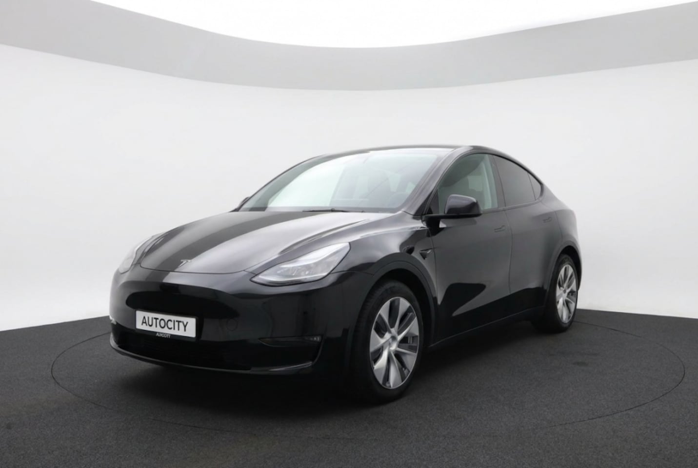 Tesla Model Y - Long Range AWD 75kWh Full Self Driving l Warmtepomp l Trekhaak afneembaar - AutoWereld.nl