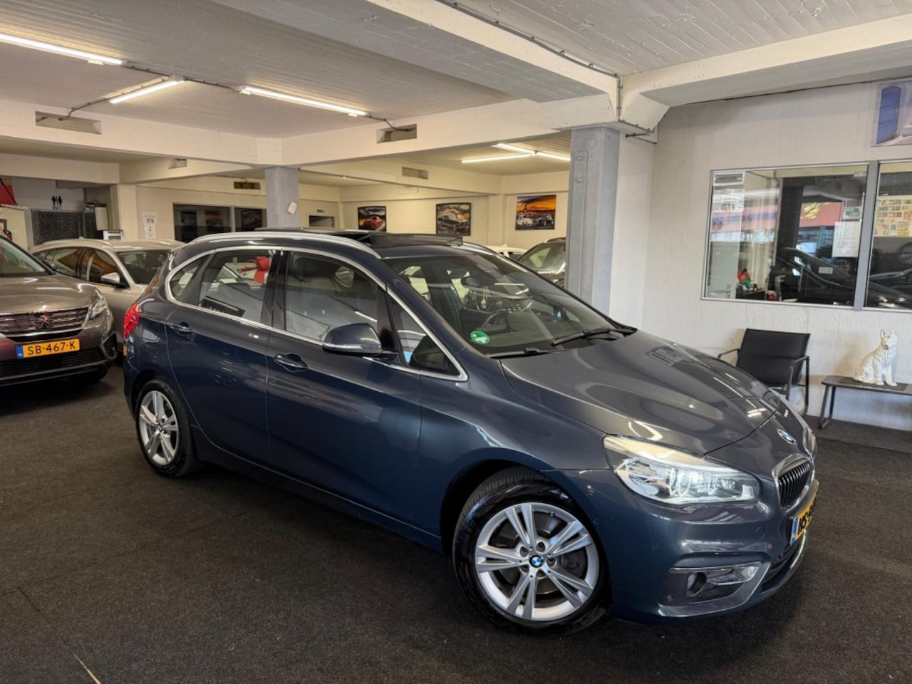 BMW 2-serie Active Tourer - 225xe Cent.High Ex.*Pano*NAP*Leder*Velgen - AutoWereld.nl