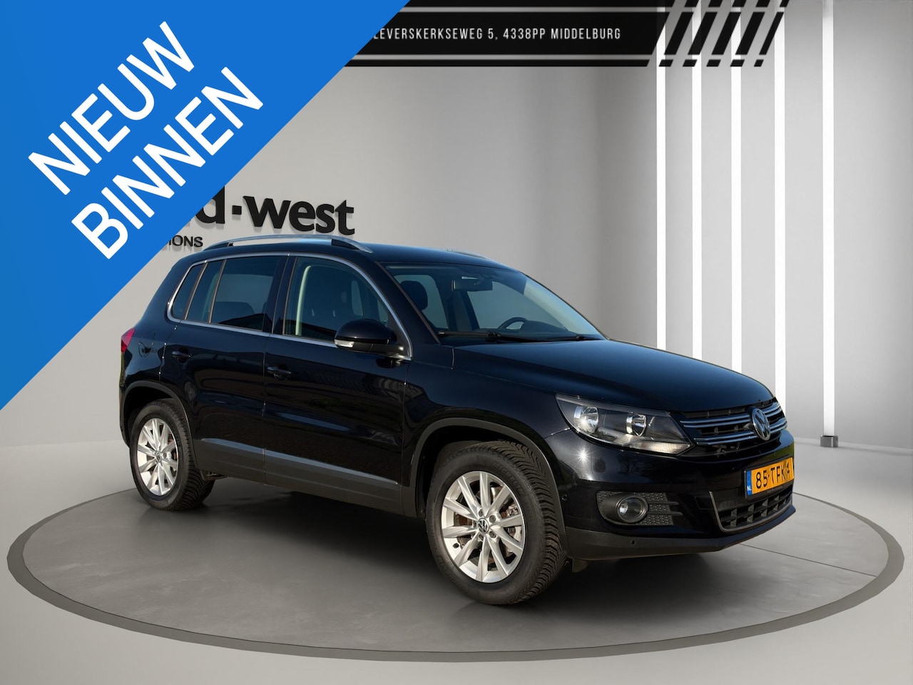 Volkswagen Tiguan - 1.4 TSI Sport&Style Clima Cruise PDC Trekhaak - AutoWereld.nl