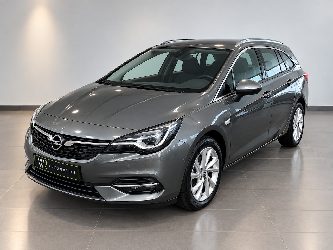 Opel Astra Sports Tourer - 1.2 Ultimate / Winterpack / Trekhaak / Leder-alcantara / - AutoWereld.nl