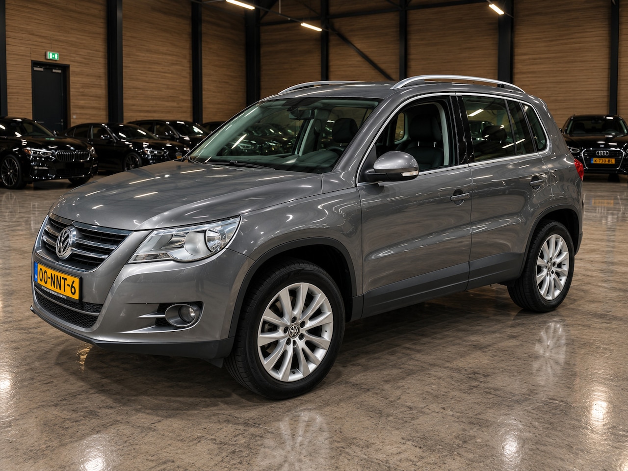 Volkswagen Tiguan - 1.4 TSI Sport&Style Navi - AutoWereld.nl