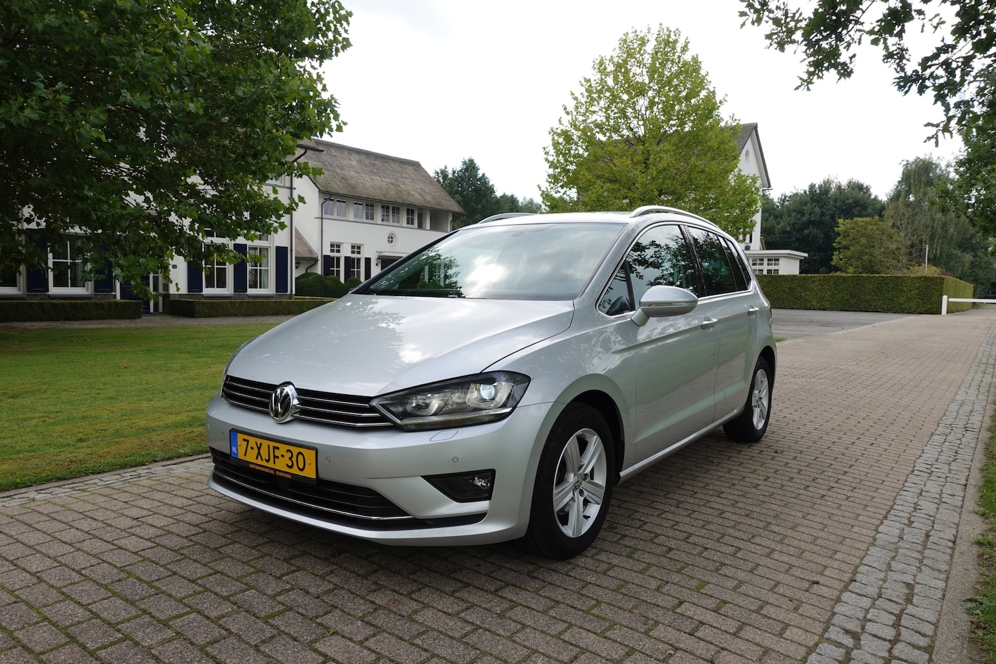 Volkswagen Golf Sportsvan - 1.4 TSI Highline | NAP | NL Auto | Trekhaak | Adaptive Cruise | Navi | PDC | - AutoWereld.nl
