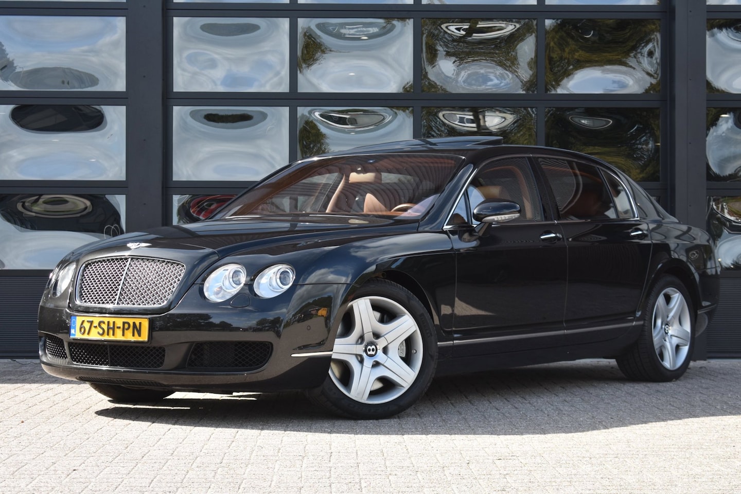 Bentley Continental Flying Spur - 6.0 W12 561pk '06 Orig NL Auto Leder Clima Navi Cruise - AutoWereld.nl