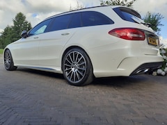 Mercedes-Benz C-klasse Estate - 180 AMG Sport Edition 360 | Leer | Panorama | Trekhaak | Burmester | incl winterbanden | NL auto | 9-G