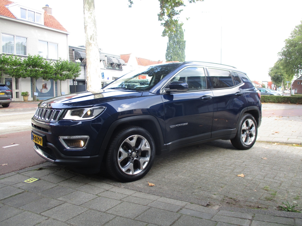 Jeep Compass - 1.4 MultiAir Limited / AIRCO / LEER / NAVI / NW-STAAT / NL.AUTO / 75dkm - AutoWereld.nl
