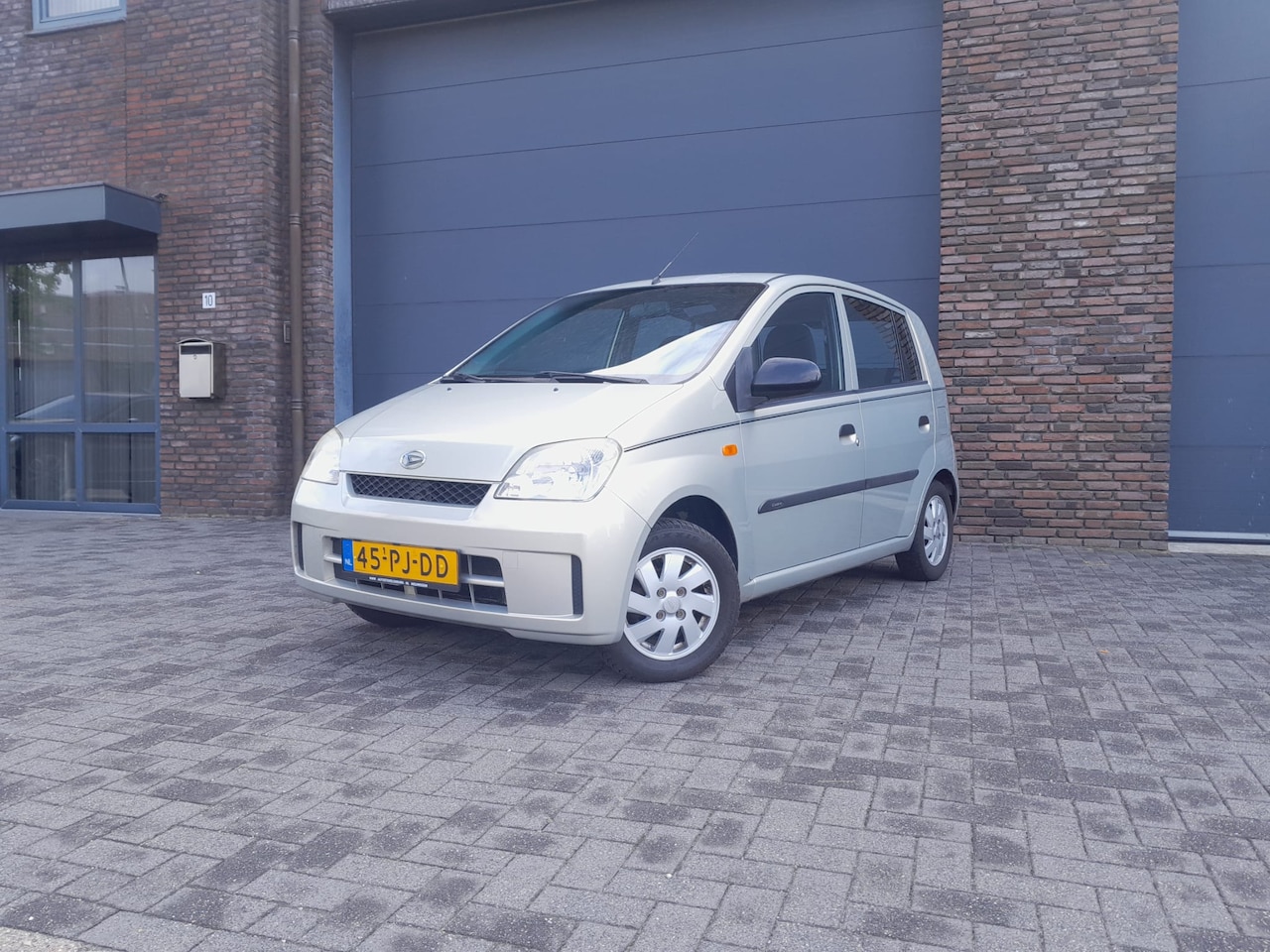 Daihatsu Cuore - 1.0-12V Nagano 140d km Nap APK Nieuw - AutoWereld.nl