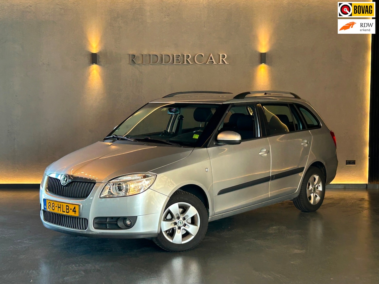 Skoda Fabia Combi - 1.4-16V Elegance|CRUISE|PARK SENS|TREKHAAK|STOELVERW| - AutoWereld.nl