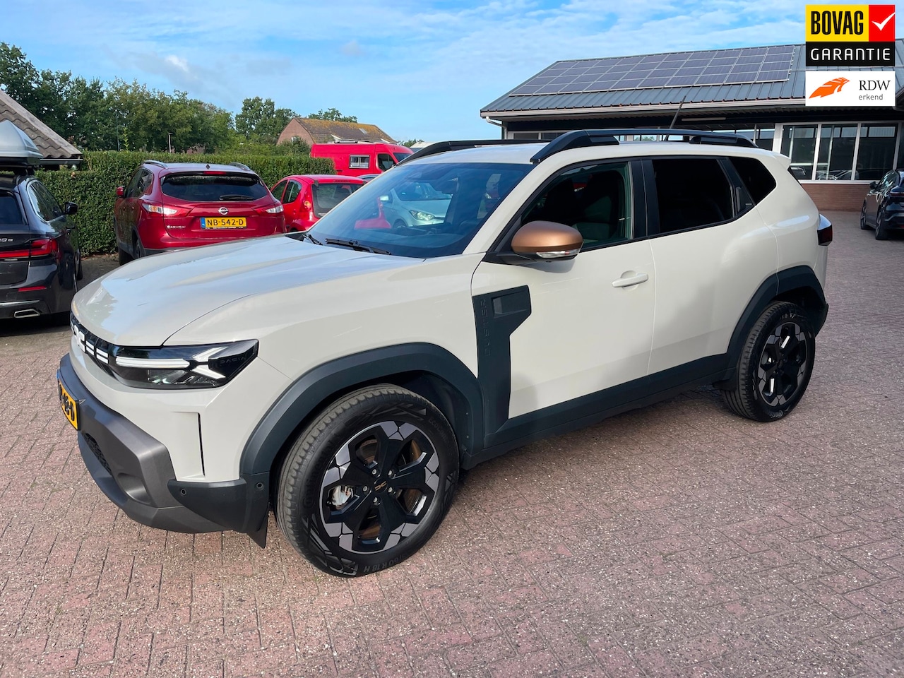 Dacia Duster - 1.6 Hybrid 140 Extreme 1.6 Hybrid 140 Extreme, Navi, 360 Camera - AutoWereld.nl