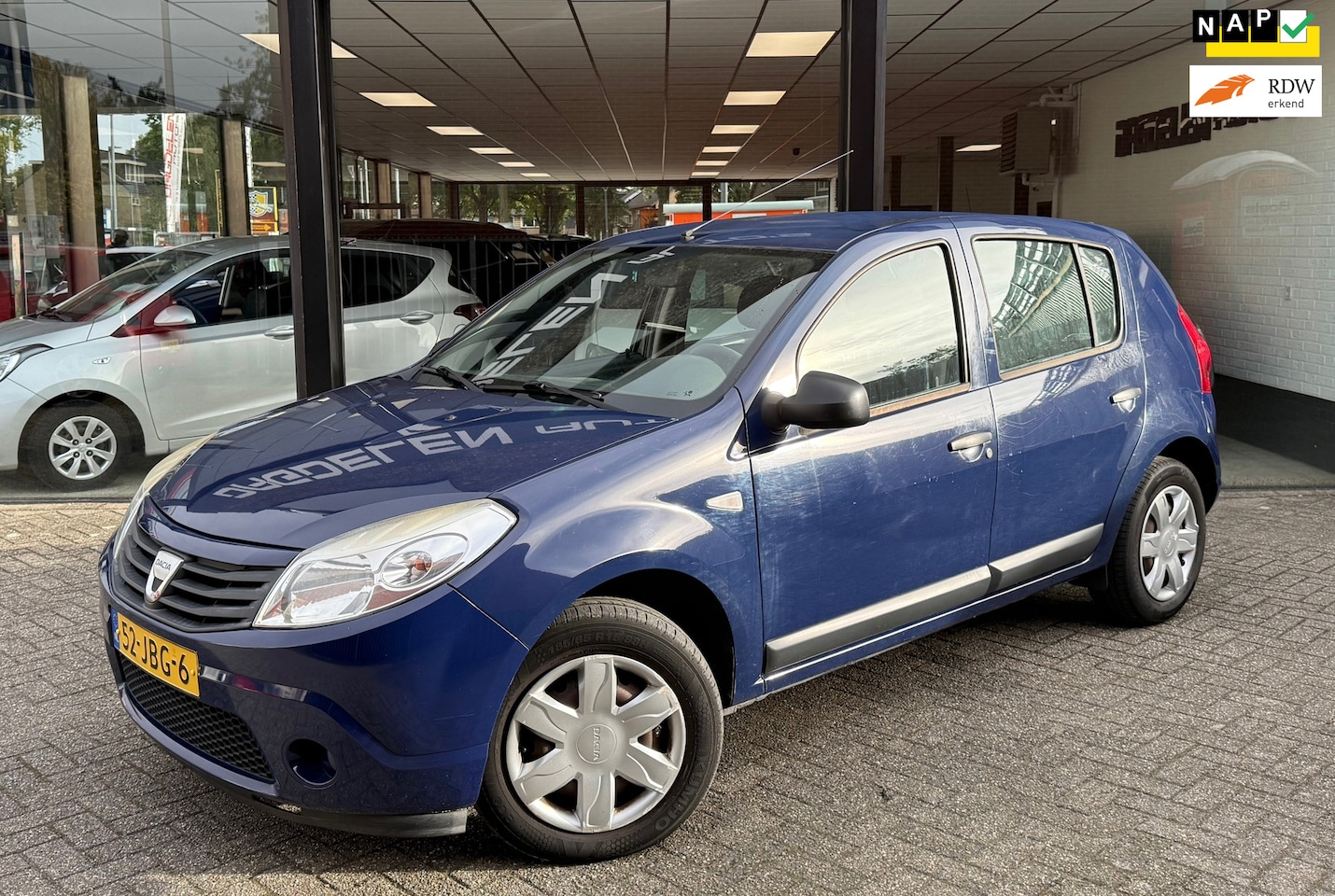 Dacia Sandero - 1.2 5drs Ambiance AIRCO | ELEKTR PACK | NAP - AutoWereld.nl