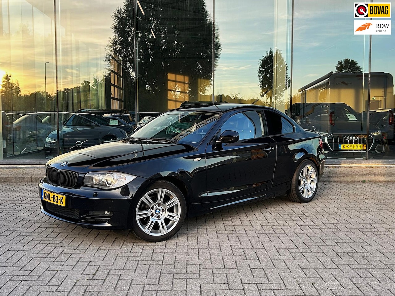 BMW 1-serie Coupé - 120i High Executive | Revisie motor | Automaat | Cruise | Clima | PDC | Leder - AutoWereld.nl