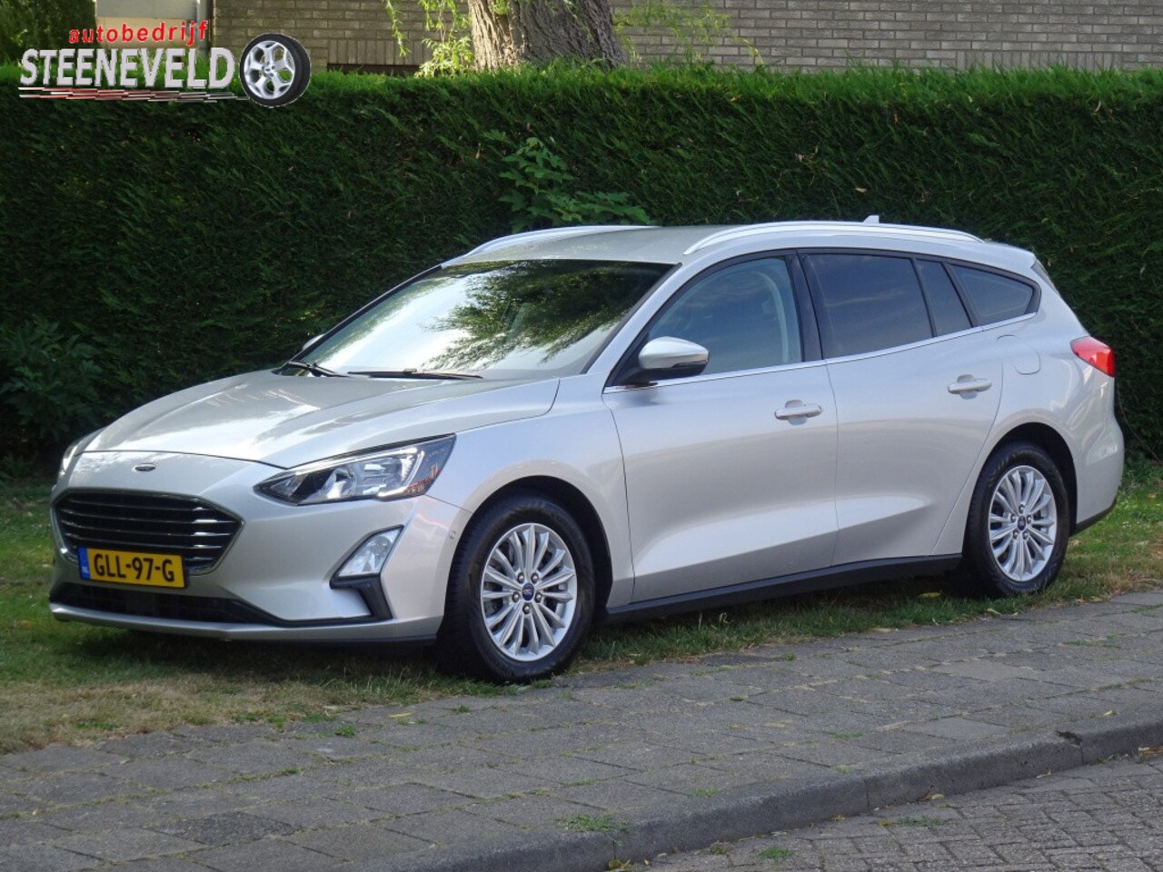 Ford Focus Wagon - 1.0 125pk Hybrid Titanium met Navi, Camera en WinterPack - AutoWereld.nl