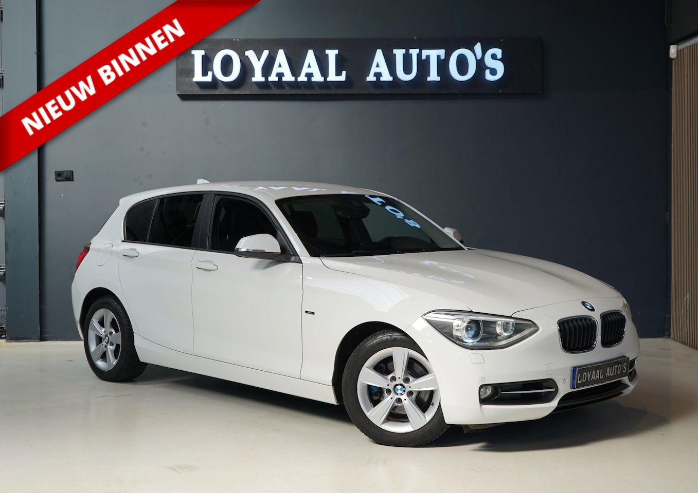 BMW 1-serie - 118i Business+ | AUT | PDC | STOELVERW. | NAVI | AIRCO | START/STOP | XENON |APK - AutoWereld.nl