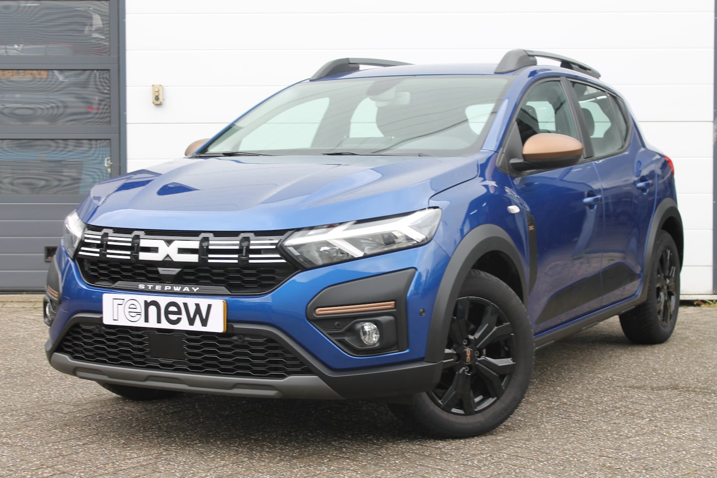 Dacia Sandero Stepway - 1.0 TCe 100 PK ECO-G Extreme | Glazen schuifkanteldak | 4 seizoensbanden | Stoelverwarming - AutoWereld.nl