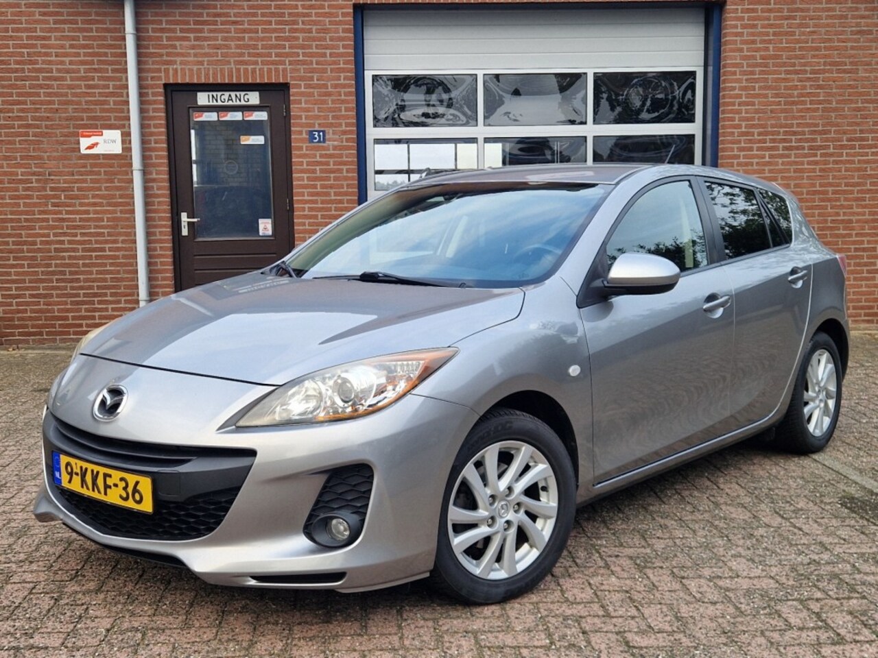 Mazda 3 - 1.6i Business NL-auto Clima Cruise Afn.Trekhaak Navi Dealer OH - AutoWereld.nl