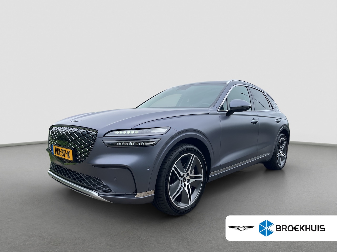 Genesis GV70 - Performance Dual Motor Premium 84 kWh 490pk | Bestuurdersstoel met geheugen | 360 graden C - AutoWereld.nl