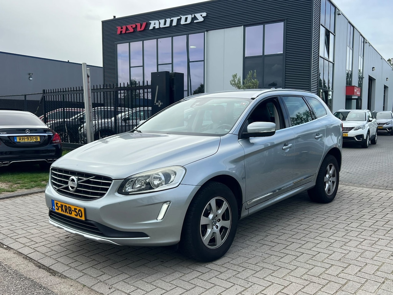 Volvo XC60 - 2.4 D5 Summum AWD navi LEER automaat - AutoWereld.nl