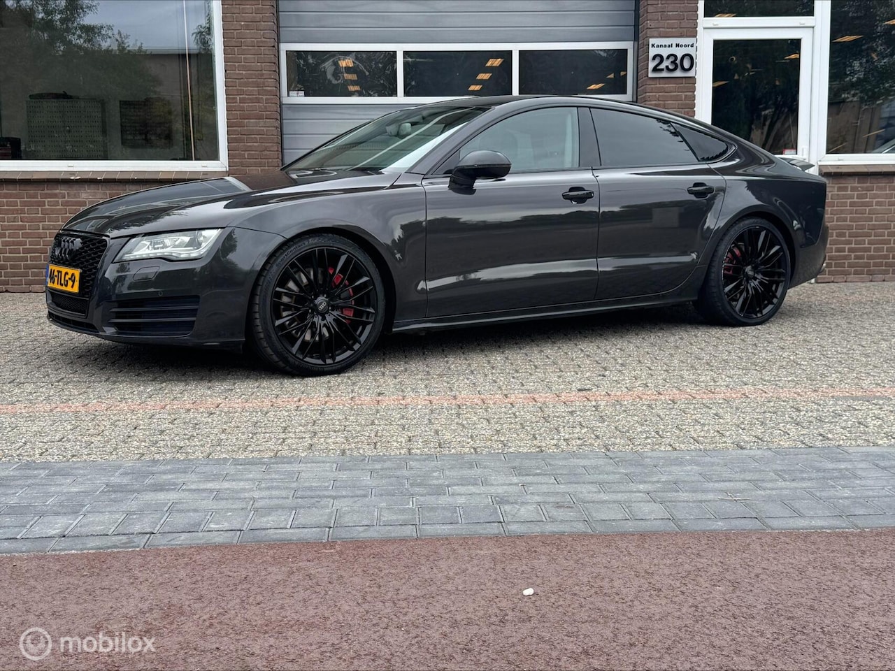 Audi A7 Sportback - 3.0 TFSI QUATTRO LEDER/NAVI/AIRCO/CRUISE - AutoWereld.nl