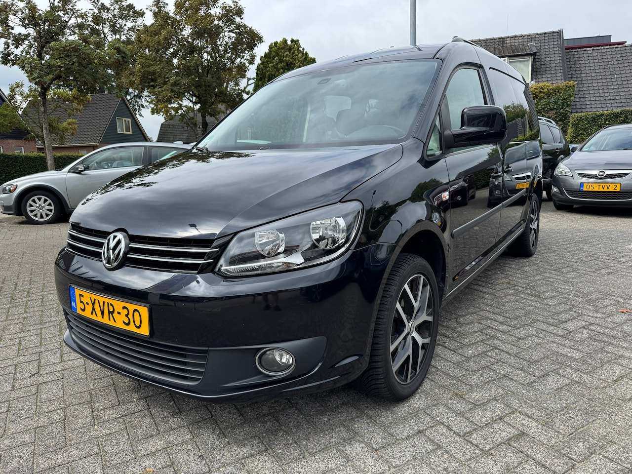 Volkswagen Caddy Maxi - 1.2 TSI Comfortline 7Prsn,Airco,Cruise,Navi,Trekhaak - AutoWereld.nl