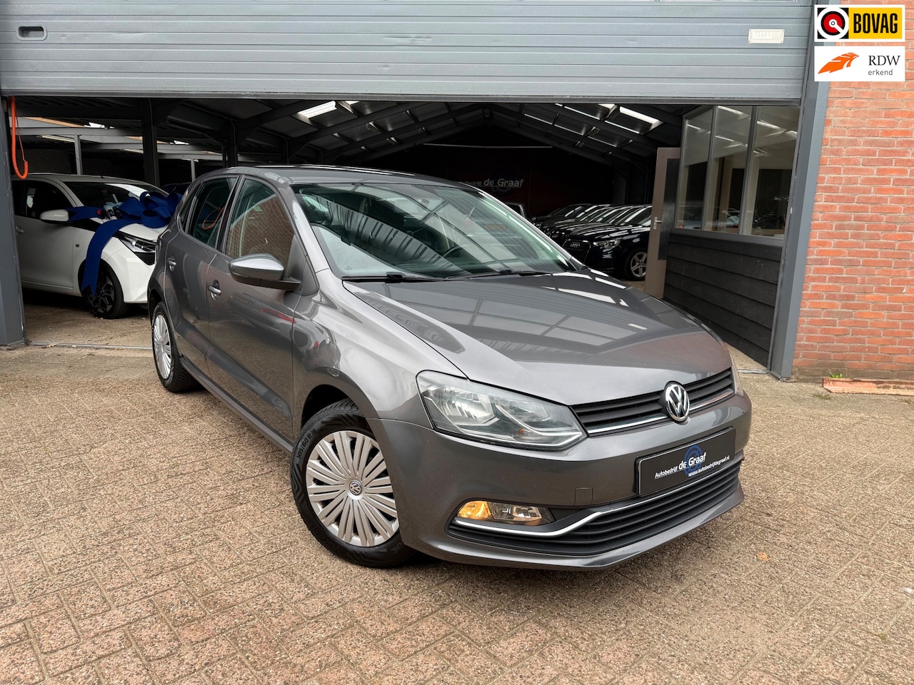 Volkswagen Polo - 1.2 TSI Comfortline|PDC/BLEUTOOTH/AUX/4SEIZOEN/ - AutoWereld.nl