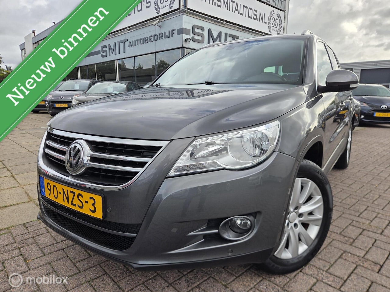 Volkswagen Tiguan - 2.0 TSI Sport&Style 4Motion Nav/Trekhaak - AutoWereld.nl