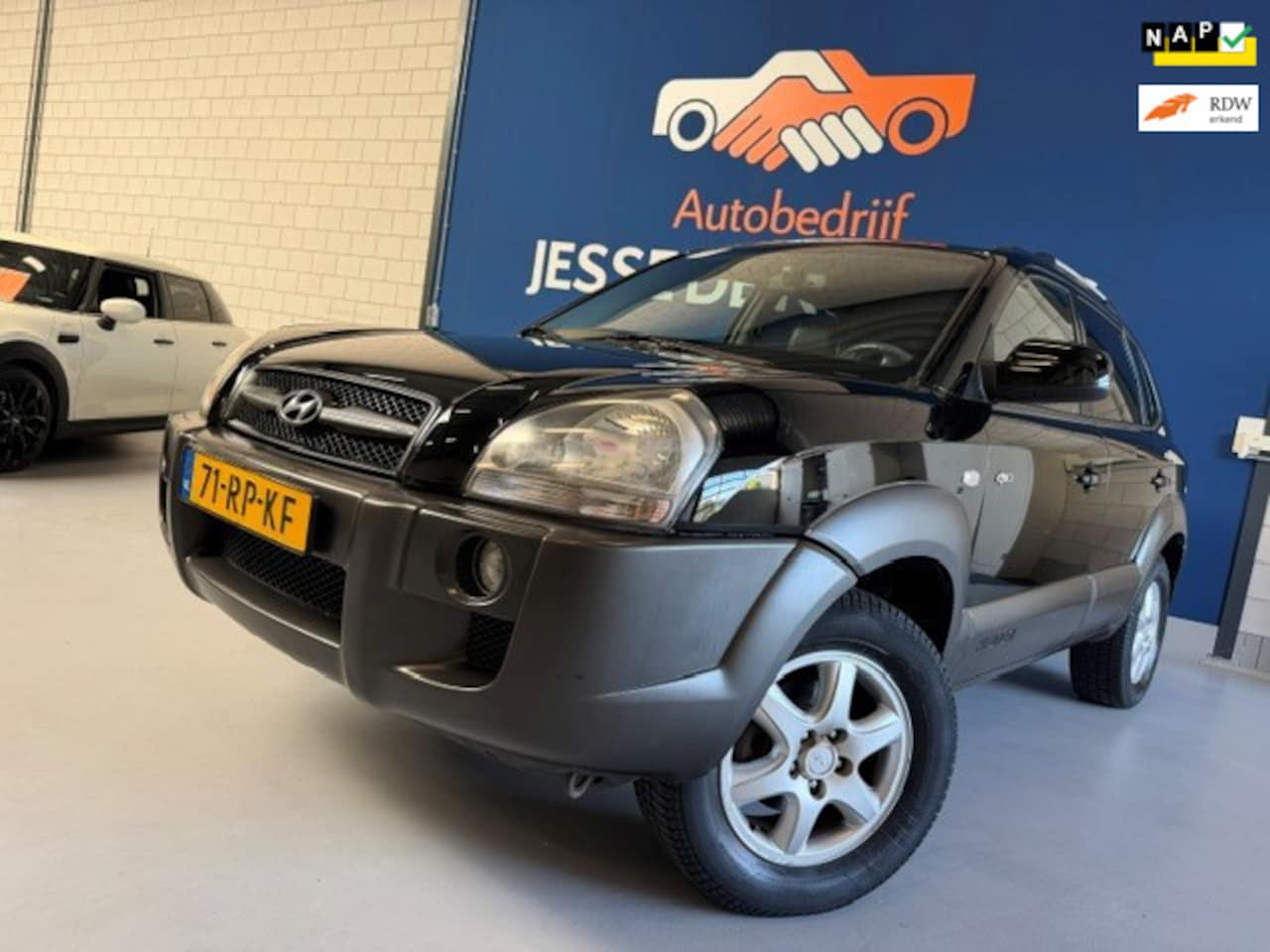 Hyundai Tucson - 2.7i V6 4WD Style Automaat / bj.2005 / leder / climate / trekhaak / airco / APK tot 09/202 - AutoWereld.nl