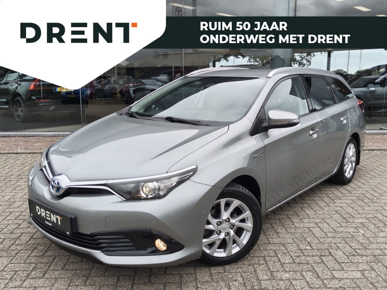Toyota Auris Touring Sports - 1.8 Hybrid Business Plus | All Season | Trekhaak | Sensoren v/a | Stoelver - AutoWereld.nl