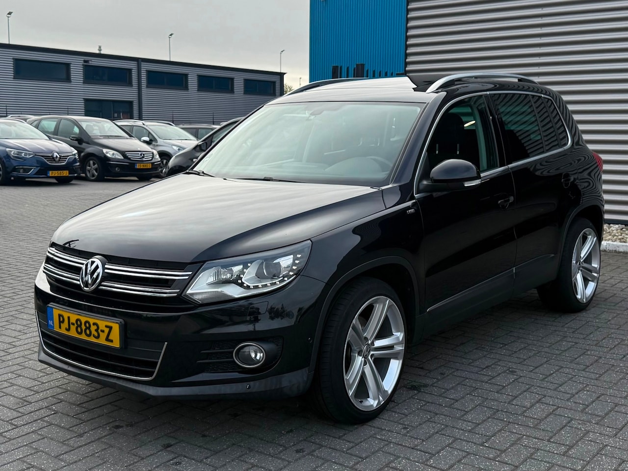 Volkswagen Tiguan - 1.4 TSI R-Line Edition 1.4 TSI R-Line Edition - AutoWereld.nl