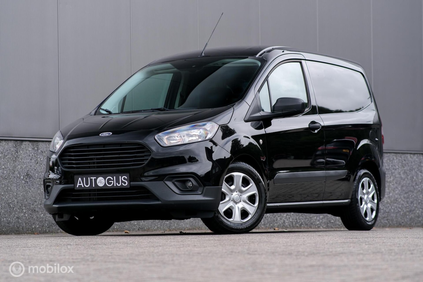 Ford Transit Courier - 1.0 Ambiente | Trekhaak | Navigatie | Stoelverwarming | Clima | Cruise | zeer nette bus | - AutoWereld.nl