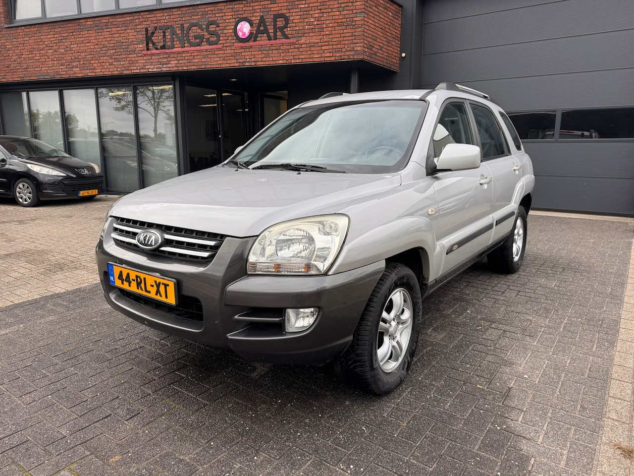 Kia Sportage - 2.0 CVVT Executive - HAGEL SCHADE - Zie foto's - AutoWereld.nl