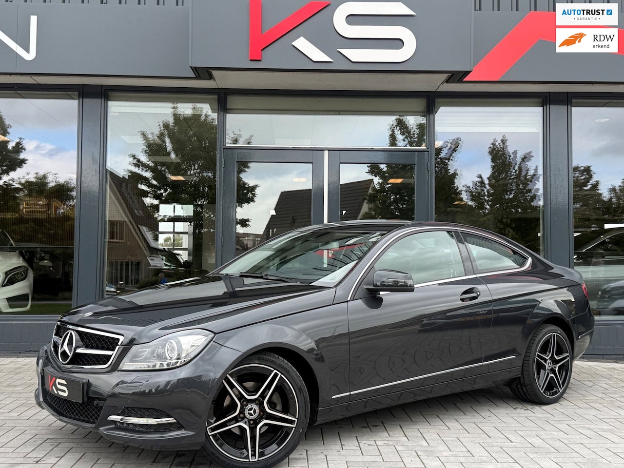 Mercedes-Benz C-klasse Coupé - 180 Ambition 18inch AMG Automaat Xenon Navi 48500km! - AutoWereld.nl
