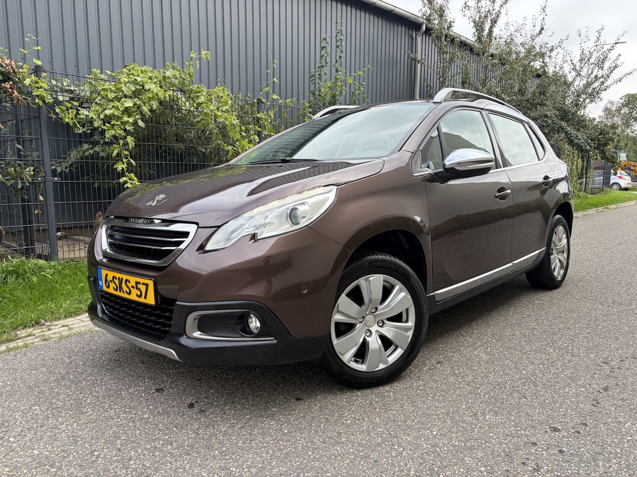 Peugeot 2008 - 1.2 VTi Allure Pack Premium Plus / AIRCO / CRUISE / NAVI - AutoWereld.nl