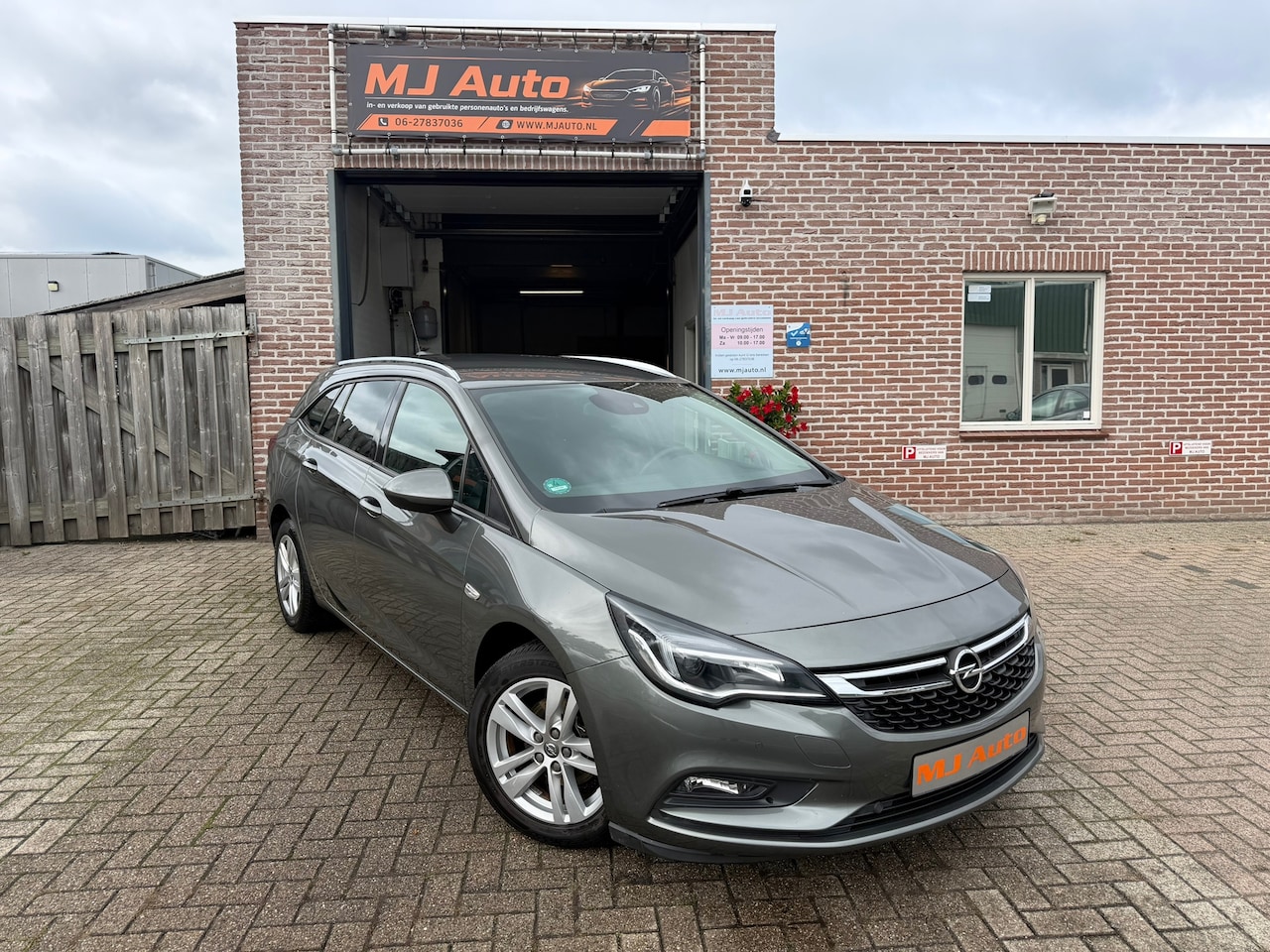 Opel Astra Sports Tourer - 1.0 Online Edition airco camera cruise control - AutoWereld.nl