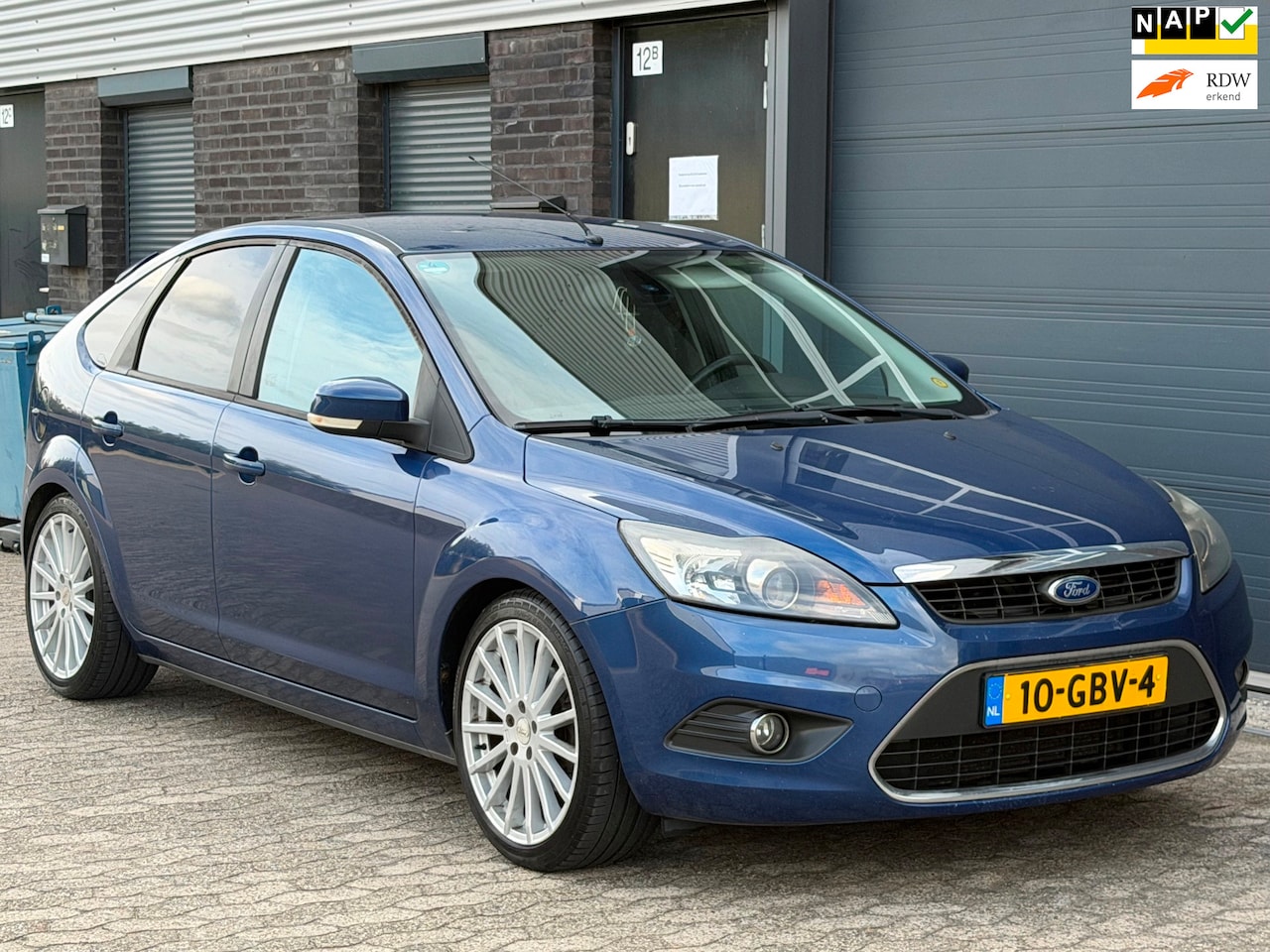 Ford Focus - 1.6 Titanium LEER NAVI CLIMA TREKHAAK APK - AutoWereld.nl