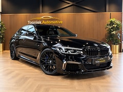 BMW 5-serie - M550i xDrive High Executive Bom vol | leder | beeldschermen achterin | en een adembenemend