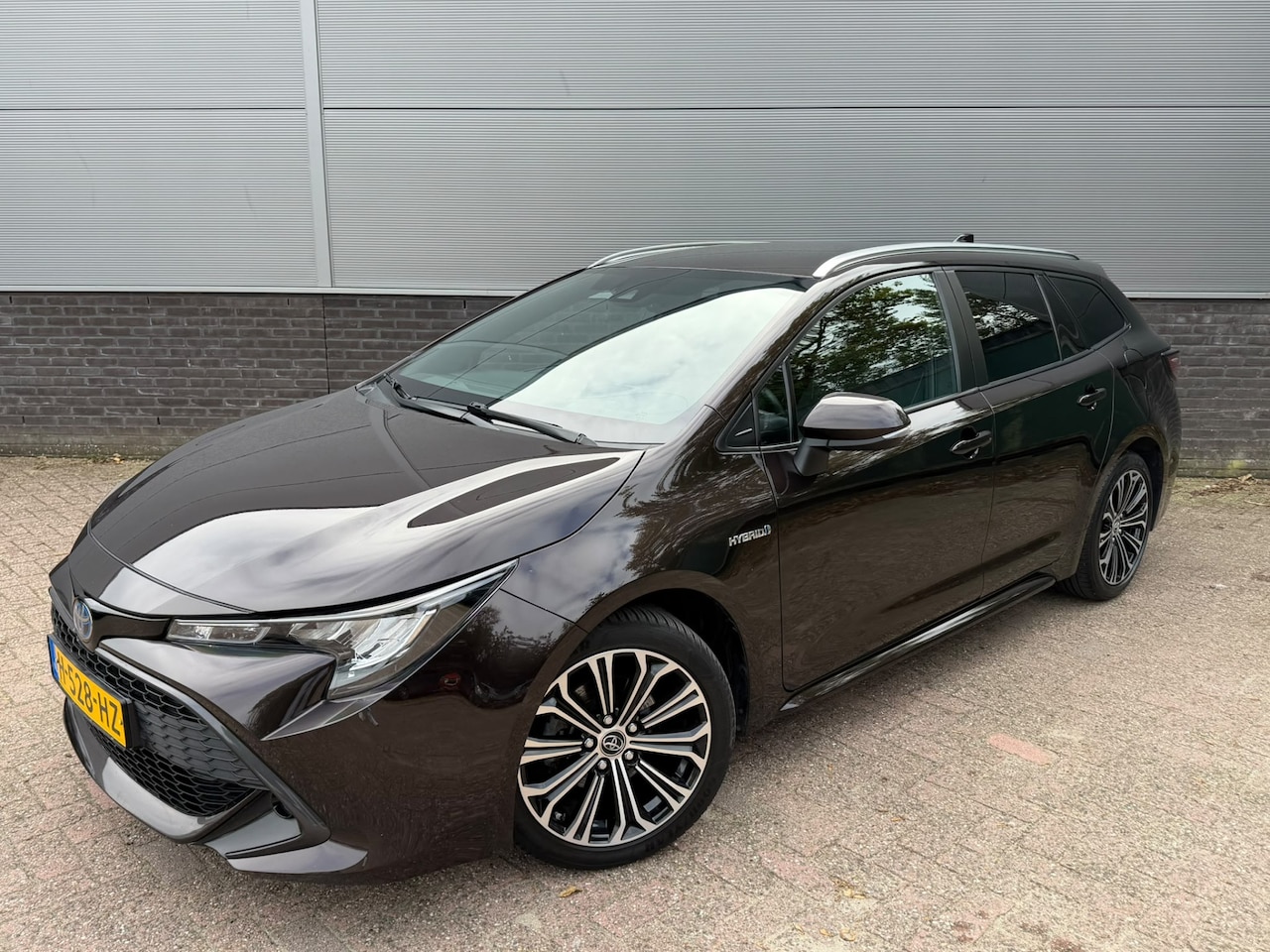 Toyota Corolla Touring Sports - 1.8 Hybrid First Edition Limited Stoel + Stuurverwarming - AutoWereld.nl