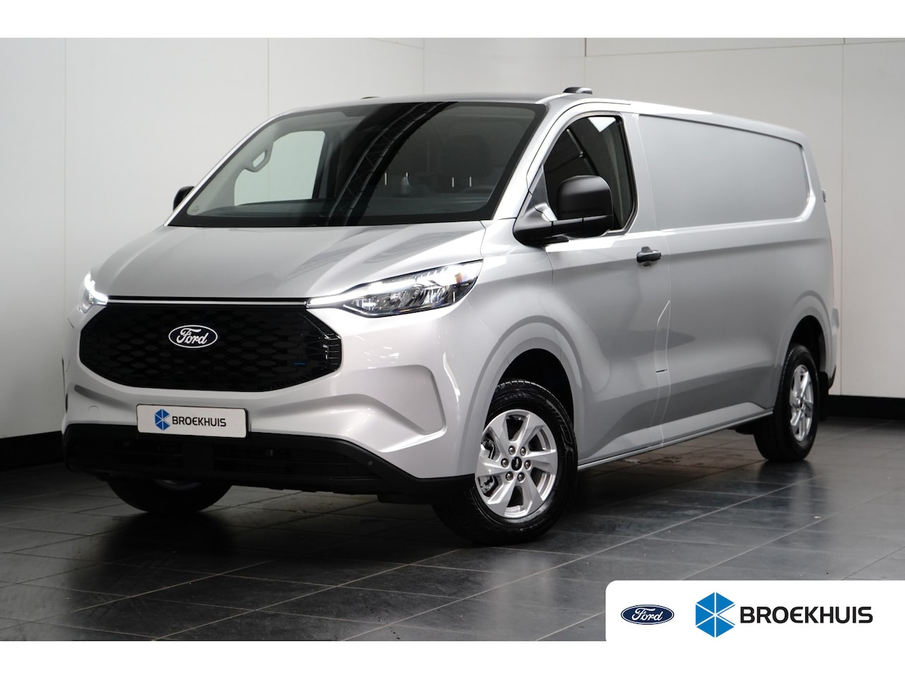 Ford Transit Custom - E-Transit 71kWh 340 L2H1 | 16inch | Stoel/Voorruitverwarming | 370KM | LED | | 2 zitplaats - AutoWereld.nl