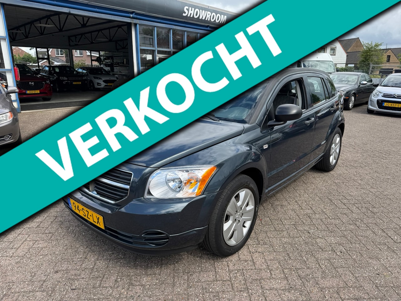 Dodge Caliber - 2.0 Automaat I Airco I Cruise I Trekhaak I PDC I Rijklaar ! - AutoWereld.nl