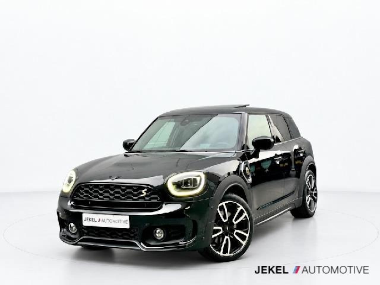 MINI Countryman - 1.5 Cooper S E ALL4 JCW Pack 19", H/K, Panoramadak, HUD, enz - AutoWereld.nl