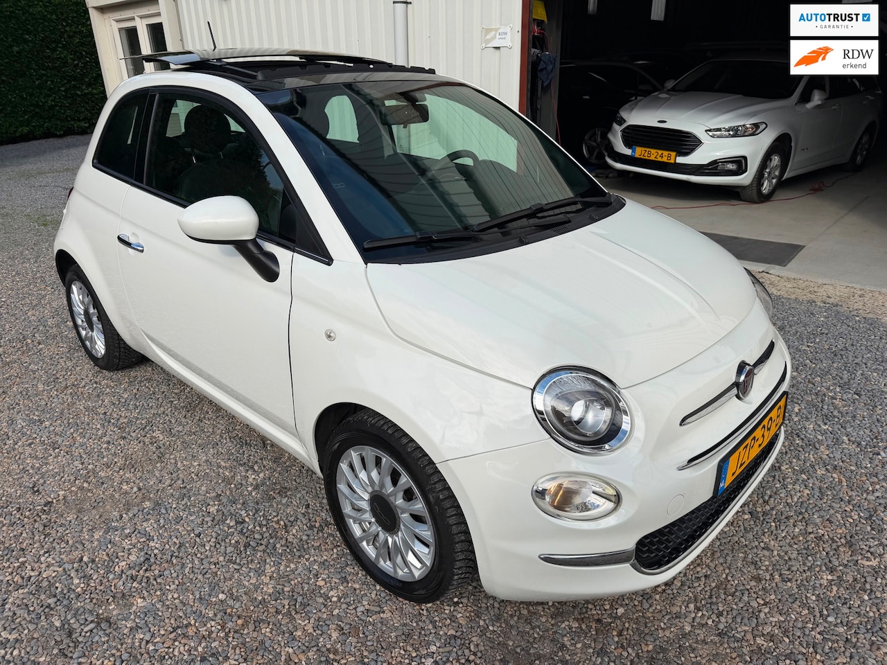 Fiat 500 - 1.0 Hybrid Dolcevita PANORAMADAK.LEER.NEW-APK! - AutoWereld.nl