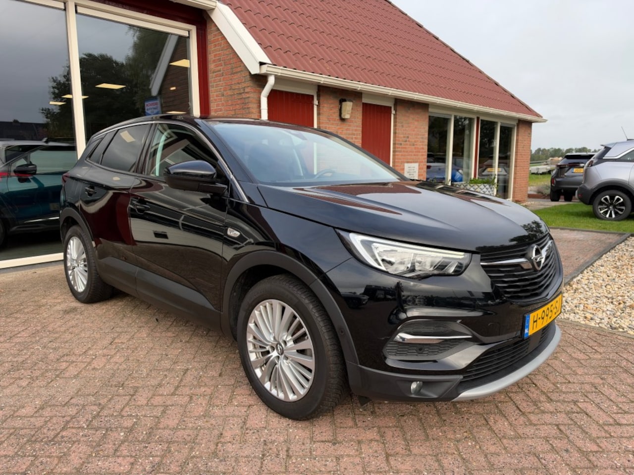Opel Grandland X - 1.2 TURBO INNOVATION TREKHAAK/Camera/CRUISE/ENZ. - AutoWereld.nl