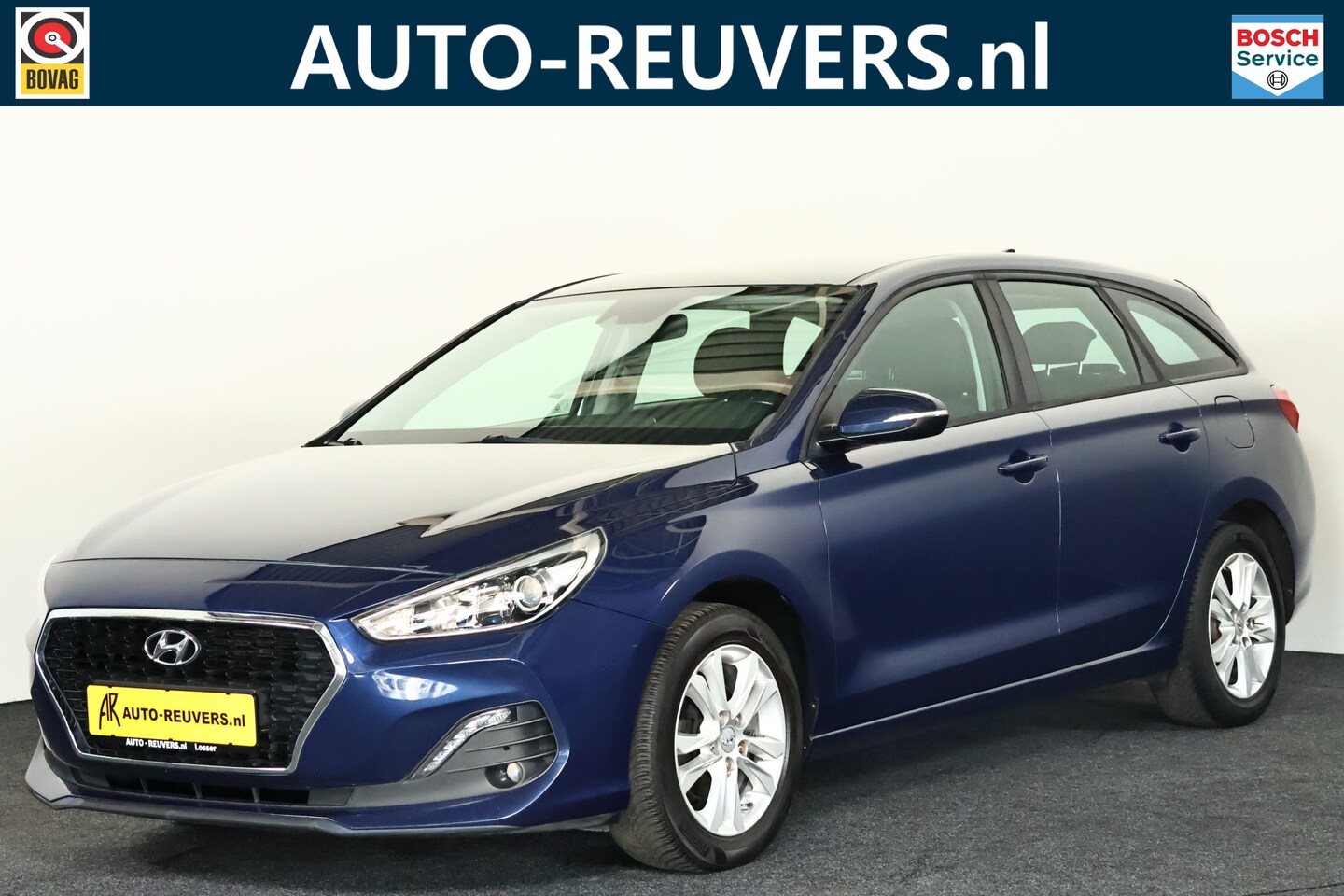 Hyundai i30 Wagon - 1.4 Navi / Cruisecontrol / PDC / CarPlay / Airco - AutoWereld.nl