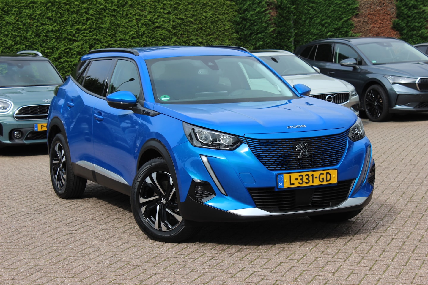 Peugeot e-2008 - EV Allure Pack 50 kWh / SoH 91 % / Camera / Keyless / CarPlay / Half Leder / 17'' / Stoelv - AutoWereld.nl